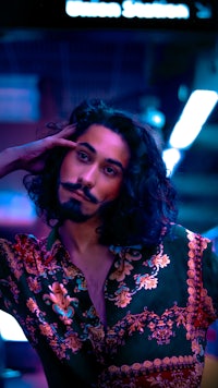 a man with long hair and a beard